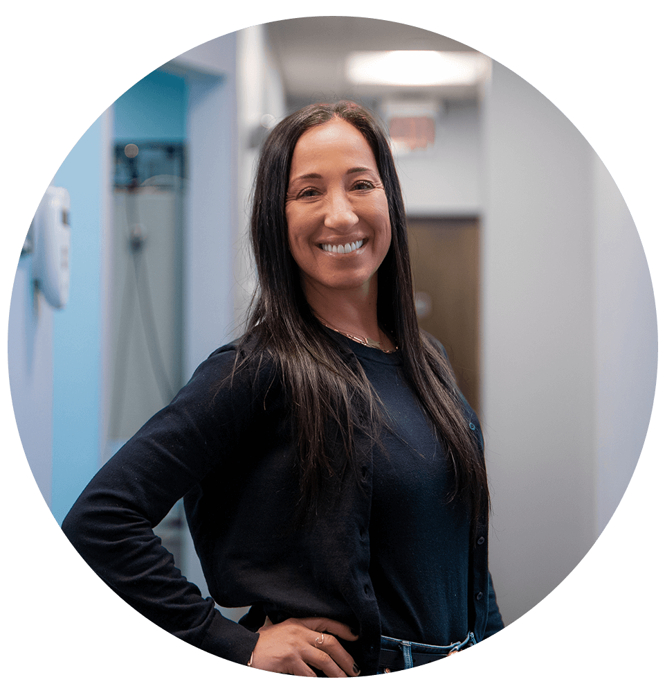 headshot of patient smiling brightly