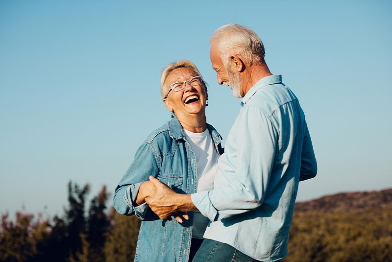 woman man outdoor senior couple happy lifestyle retirement together smiling