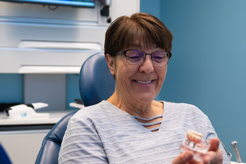 patient smiling brightly after their dental procedure